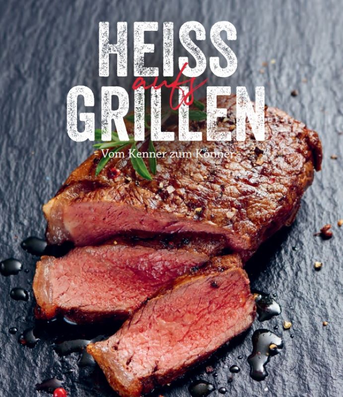 Ausschnitt der Broschüre 'Heiss aufs Grillen' mit einem Stück gegrillten Rindsbraten auf einer Schieferplatte